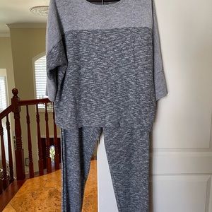Nicely embellished 2 Pc. track suit with tapered pants. GUC